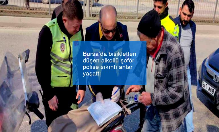 Bursa’da bisikletten düşen alkollü şoför polise sıkıntı anlar yaşattı